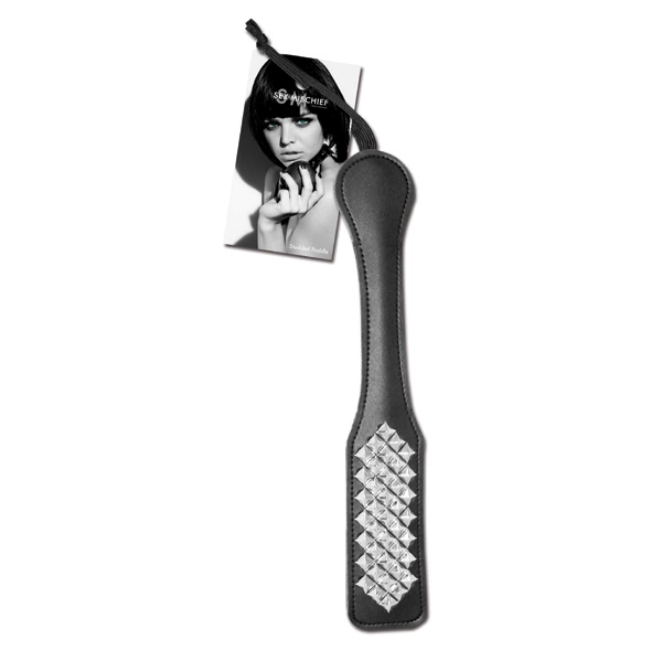 <p>Discover the versatility of the Sportsheets S&M Studded Paddle