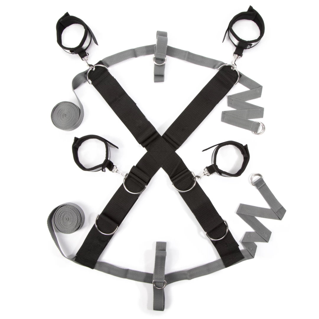 Fifty Shades of Grey Over the Bed Cross - Zestaw wiązań łożkowych regulowanych - Boutique Anelma <p><strong>Fifty Shades of Grey Over the Bed Cross Restraint System with Soft Cuffs</strong> is an elegant and versatile solution designed for those seeking to enhance their experience with a premium restraint system. This deluxe set allows for fully adjustable positioning of wrists and ankles