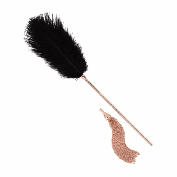 <p>Discover versatility and elegance with the Rosy Gold Feather Tickler & Whip â€“ an innovative 2-in-1 accessory designed to enhance intimate moments. Crafted with a luxurious rose gold finish