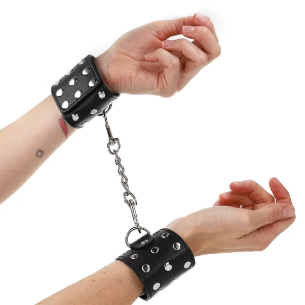 Adjustable Black Wrist Restraints with Rivet Detail 19-24cm x 5.5cm