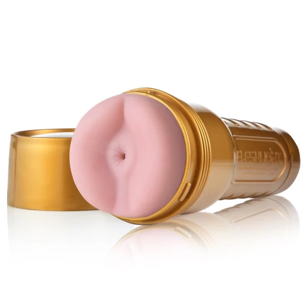 Fleshlight Stamina Training Unit STU Gold Case Intimate Machine combines soft SuperSkin material and an ergonomic design in a practical